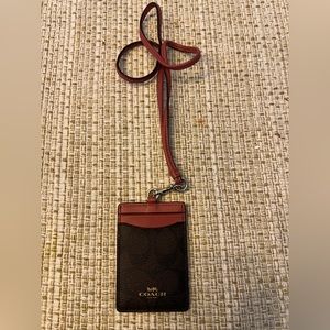 Coach signature laynard.